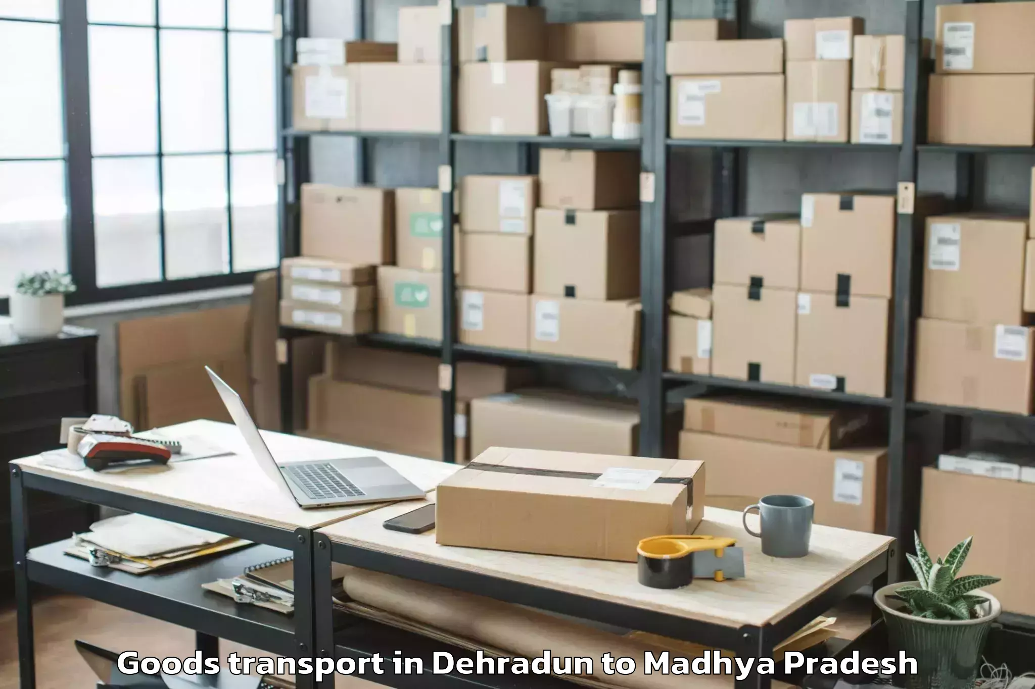 Book Dehradun to Dhamnod Goods Transport